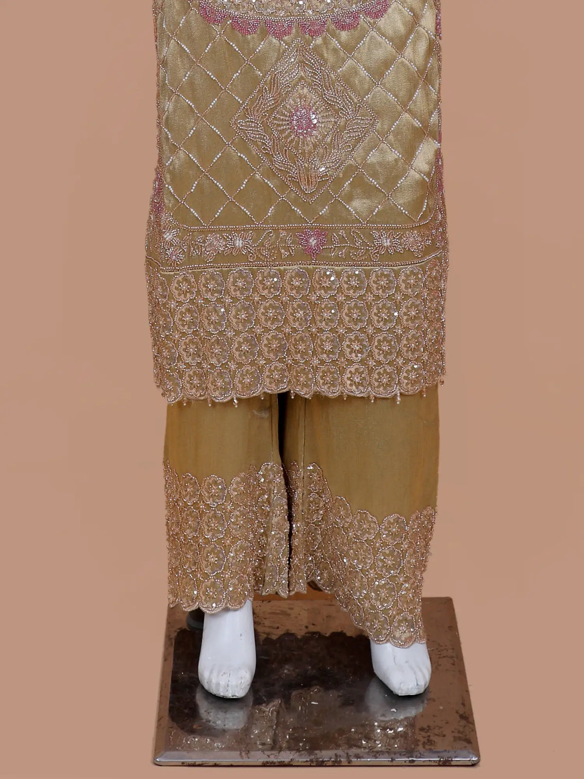 Striking Golden Shimmer Silk Designer Suit Featuring Contrast Pink Silver Work