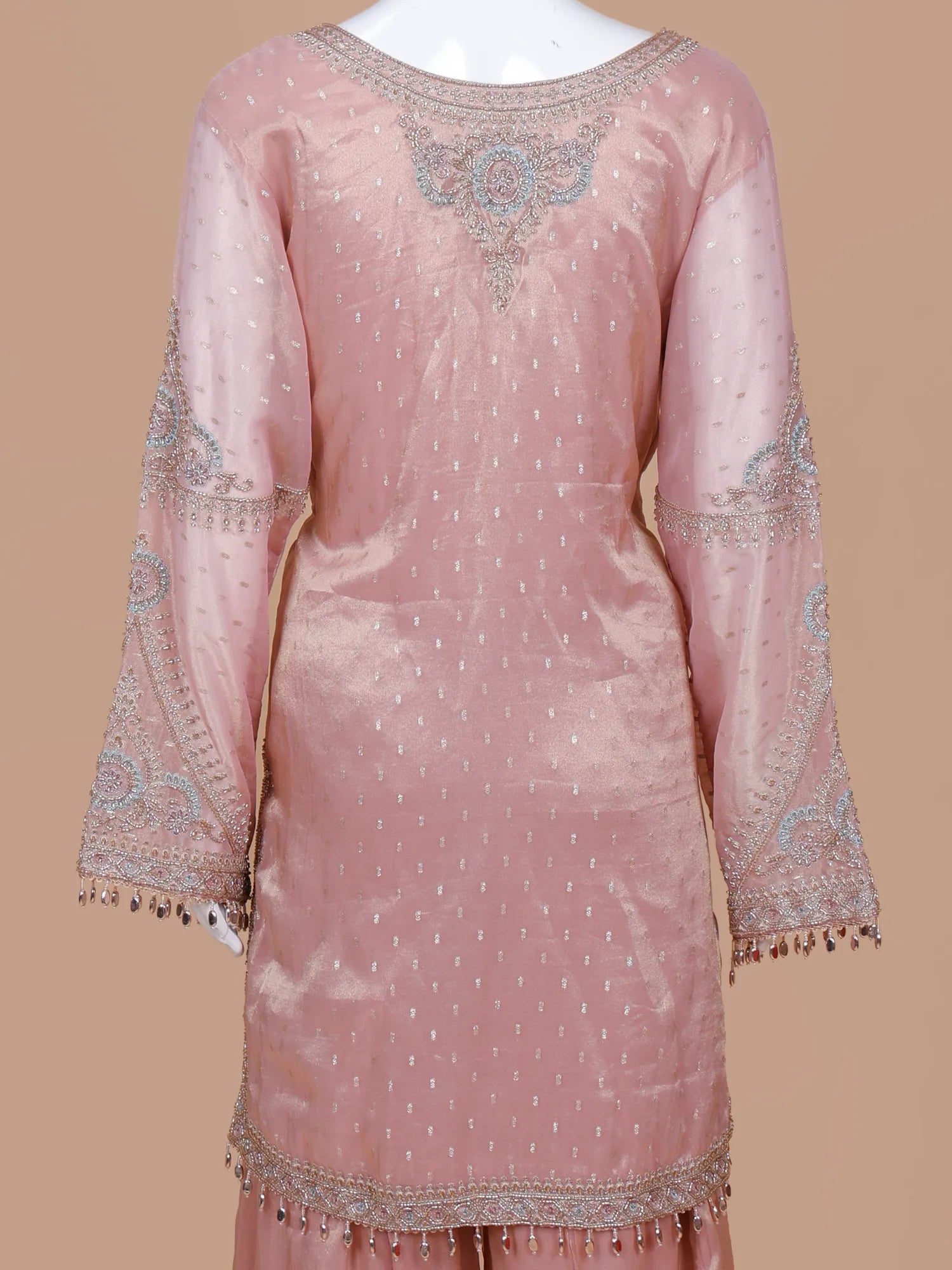 Get Light Peach Silk Traditional Suit Featuring Bead And Threadwork