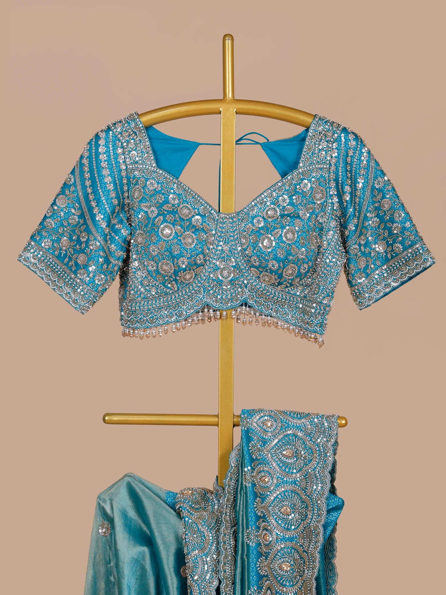 Get Rama Blue Silk Saree Online Highlighted By Moti Pearl Embellishment