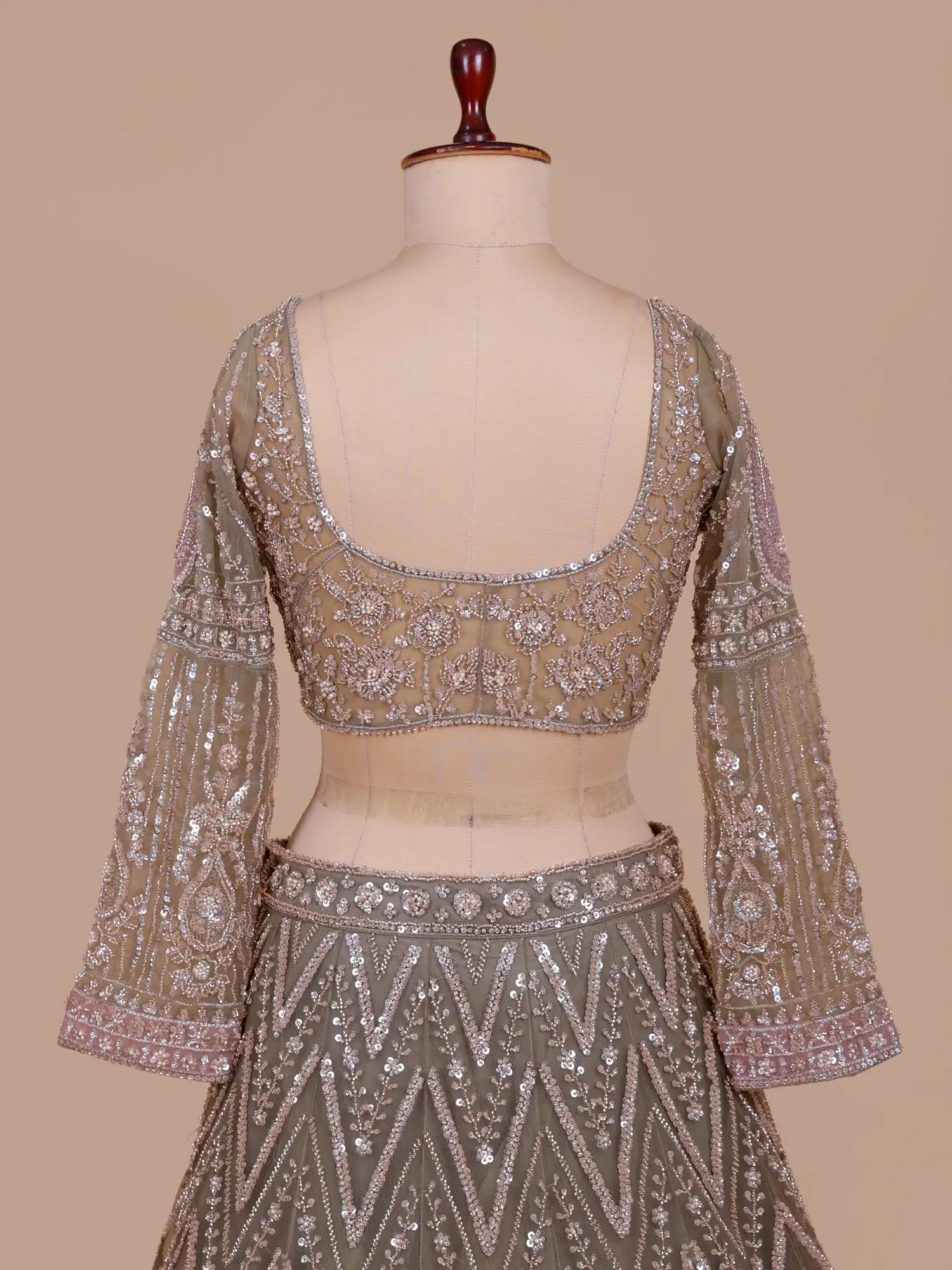 Get Mehendi Green Wedding Lehenga Featuring Applique Patch Detailing