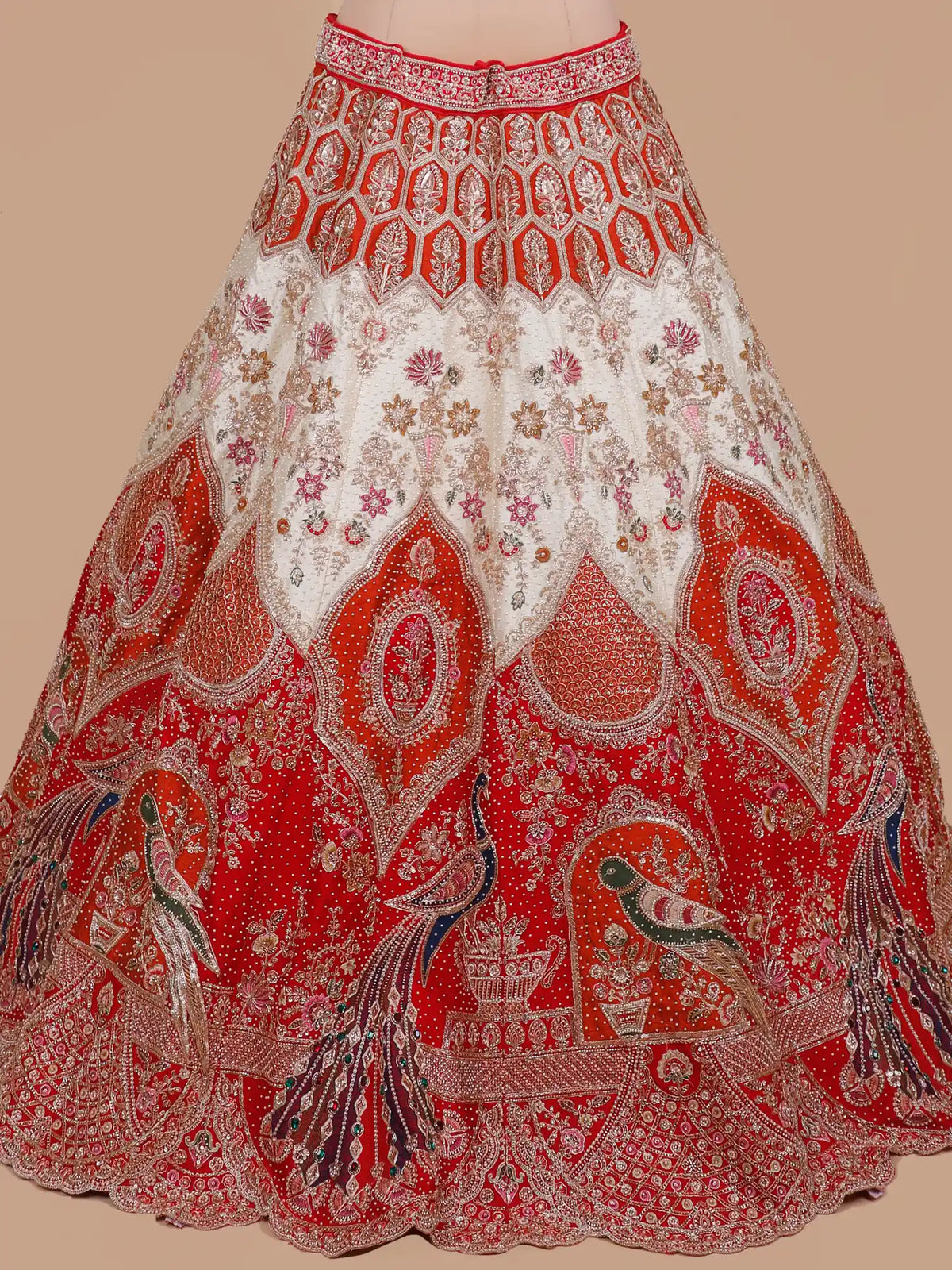 Discover Unique Red Bridal Lehenga Featuring Two-Tone Peacock Embroidery