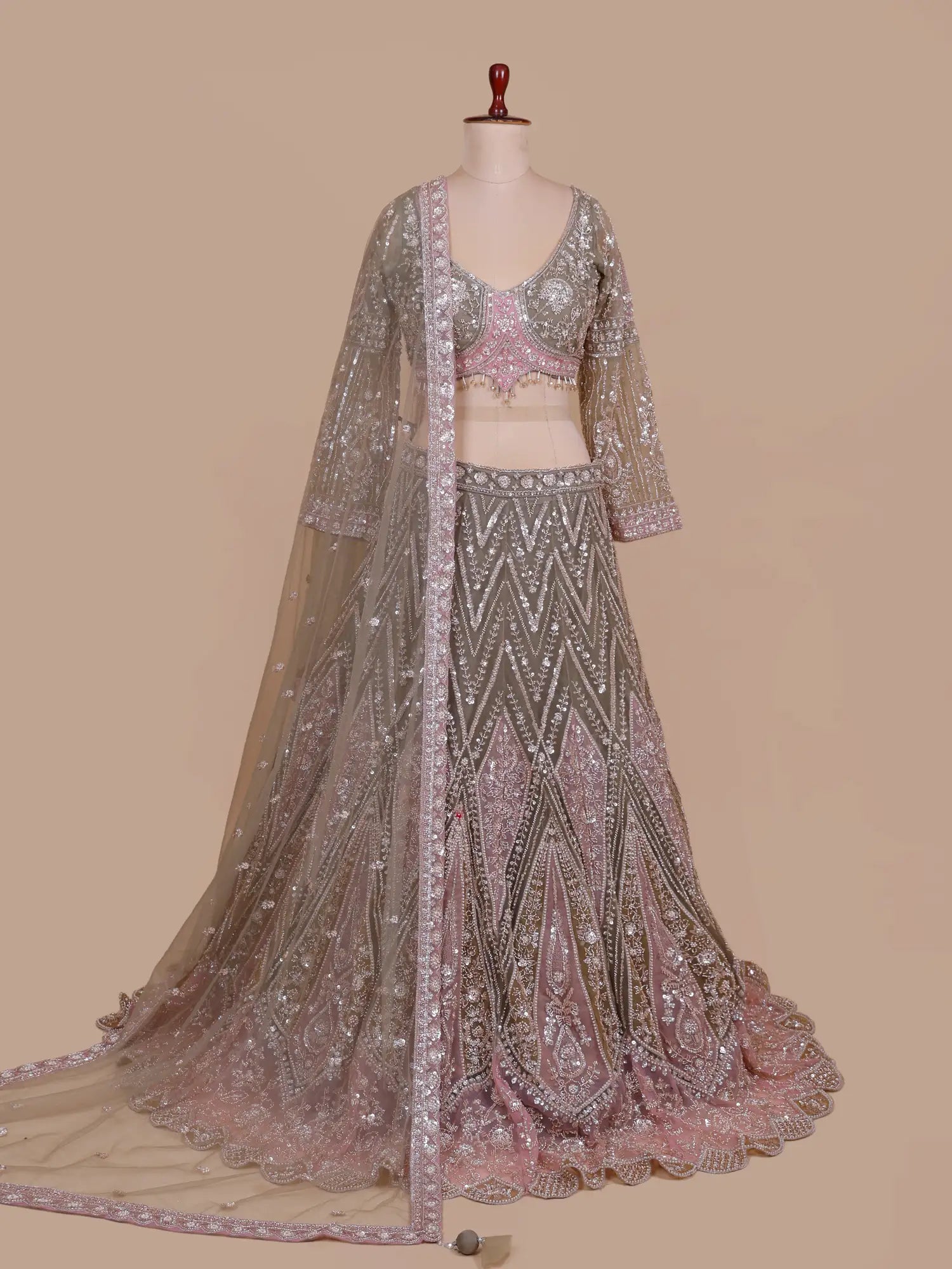Get Mehendi Green Wedding Lehenga Featuring Applique Patch Detailing