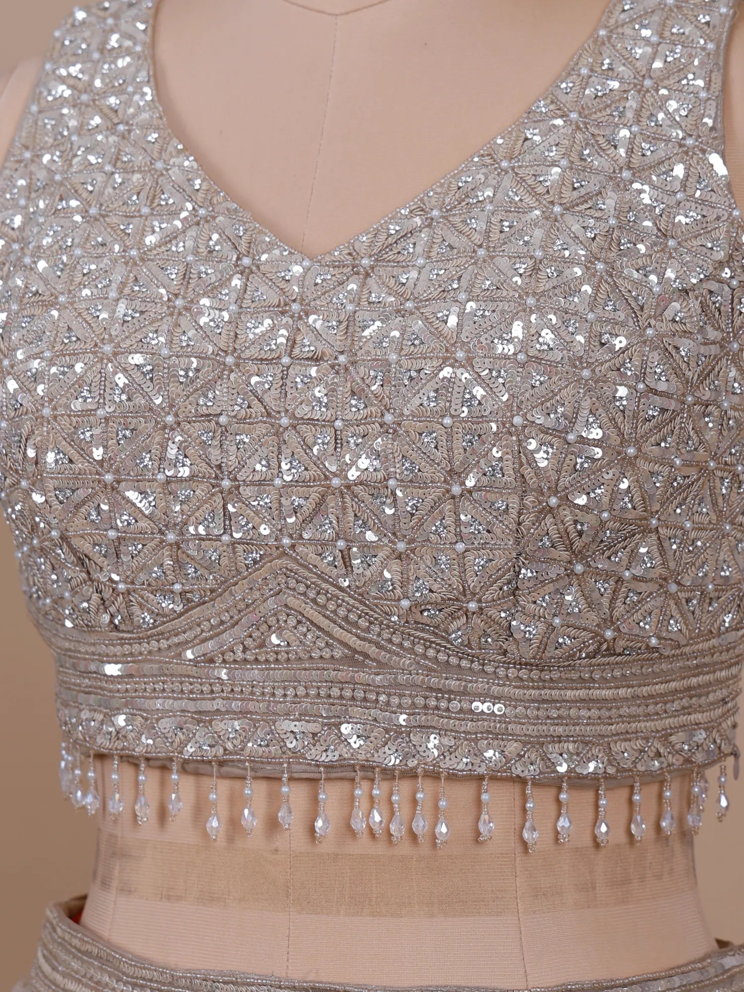 Buy Champagne Organza Party Wear Lehenga With Sequins Design