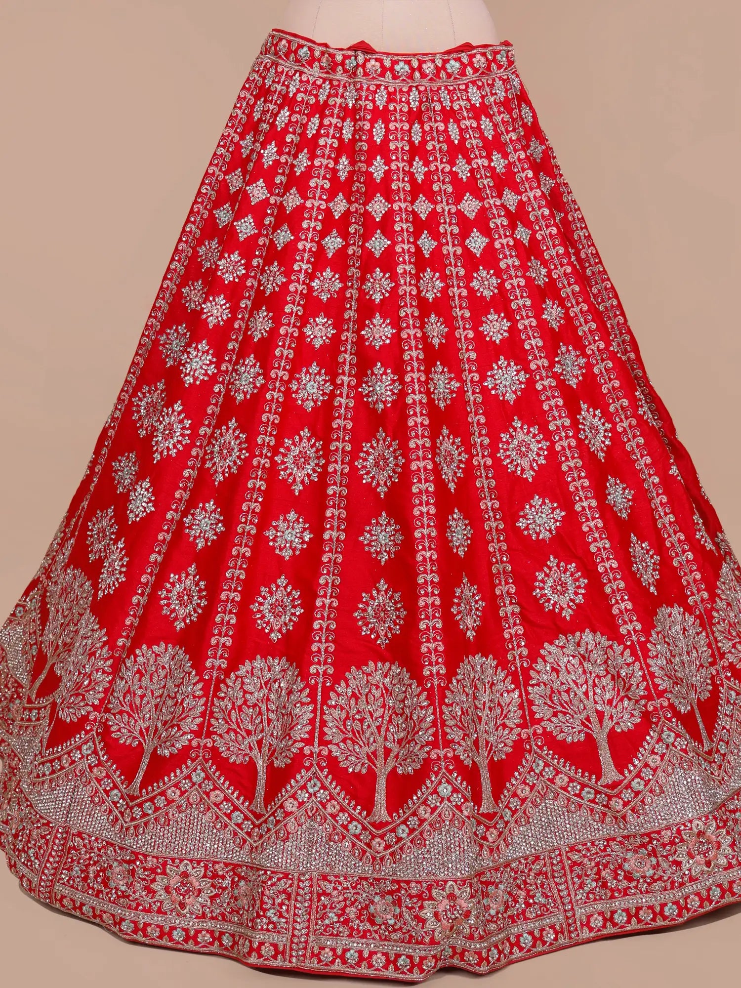 Red Royalty Silk Unstitched Bridal Lehenga Showcasing Tree Embroidery