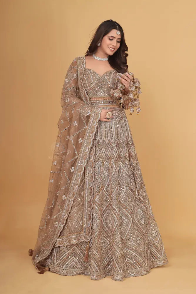 Copper Gold Net Lehenga Intricate Handwork With Sequins Jarkan And Thread