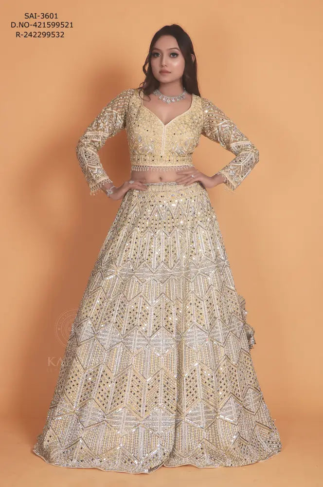 Golden Net Lehenga With Stone Work And Hand-Touch Detailing