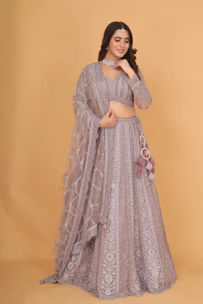 Light Purple Net Lehenga With Handwork Sequence Jarkan And Thread Detailing