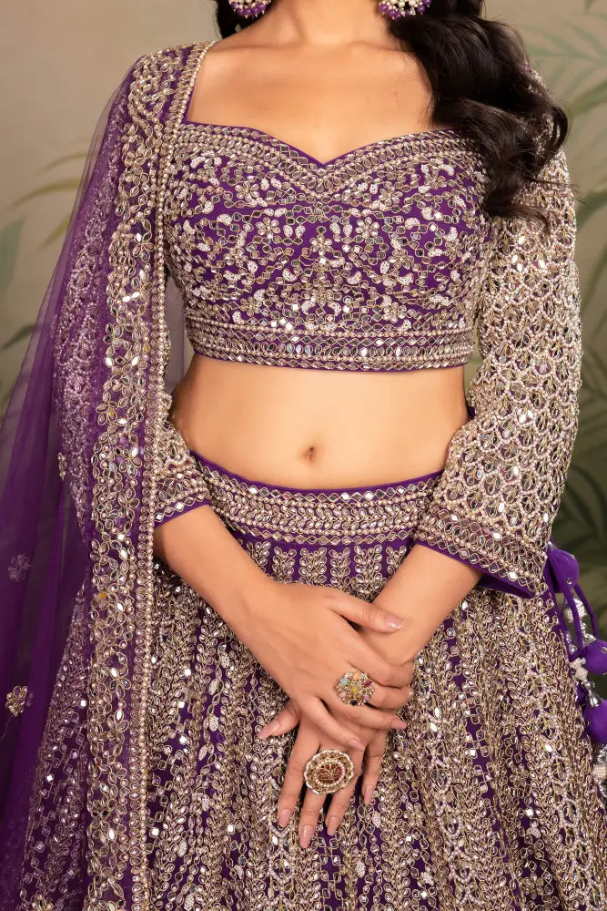 Purple Net Lehenga With Dupatta Featuring Intricate Mirror Jarkan Lehenga