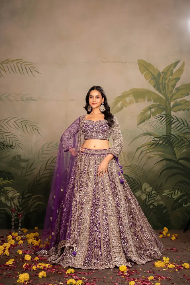 Purple Net Lehenga With Dupatta Featuring Intricate Mirror Jarkan Lehenga