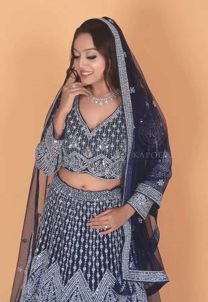Royal Blue Lehenga With Stone And Mirror Work On Net Fabric